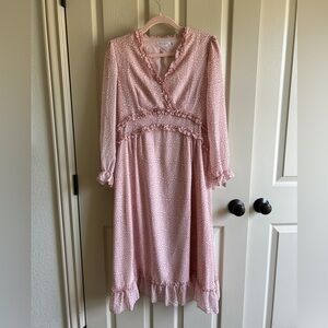 Pink patterned dress with sheer sleeves